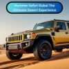 Golden Hummer driving through the Dubai desert dunes during a thrilling off-road safari adventure.