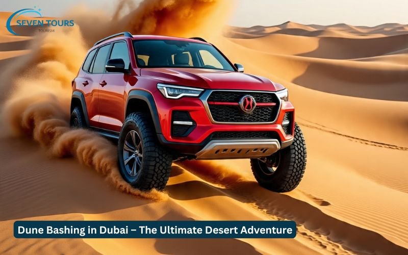 Dune Bashing in Dubai with a red SUV racing across golden desert dunes under a bright sky.