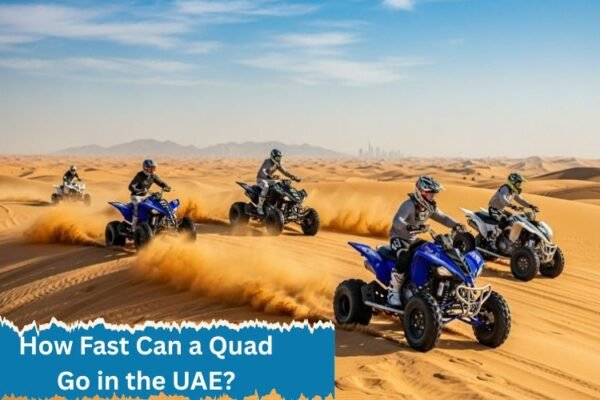 How-Fast-Can-a-Quad-Go Riders racing quad bikes across the UAE desert, showing how fast a quad can go on golden sand dunes.