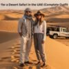 People wearing light and comfortable desert safari outfits during a UAE tour