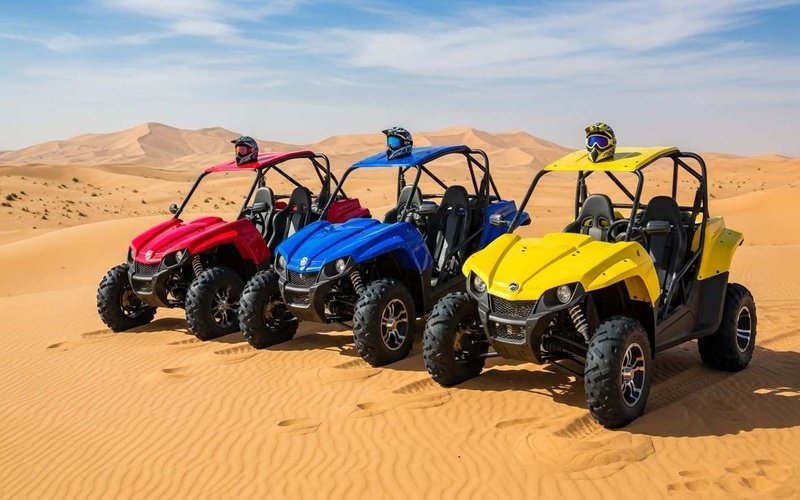 2-seater-dune-buggy-on-sandy-Dubai-desert-dune-with-helmets-and-goggles-ready-for-a-self-drive-adventure-and-safety-briefing.