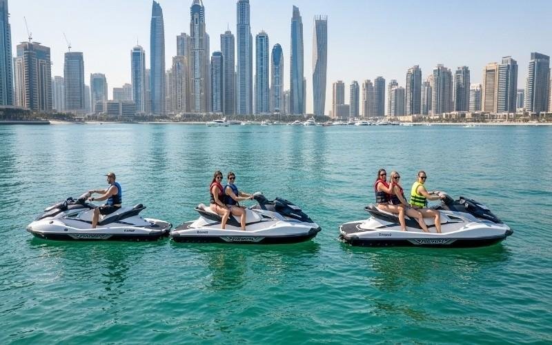 Three-jet-skis-lined-up-on-calm-water-in-Dubai,-showing-short,-medium,-and-long-ride-options-for-tourists